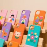 Smartphone cases displayed in various colors and designs
