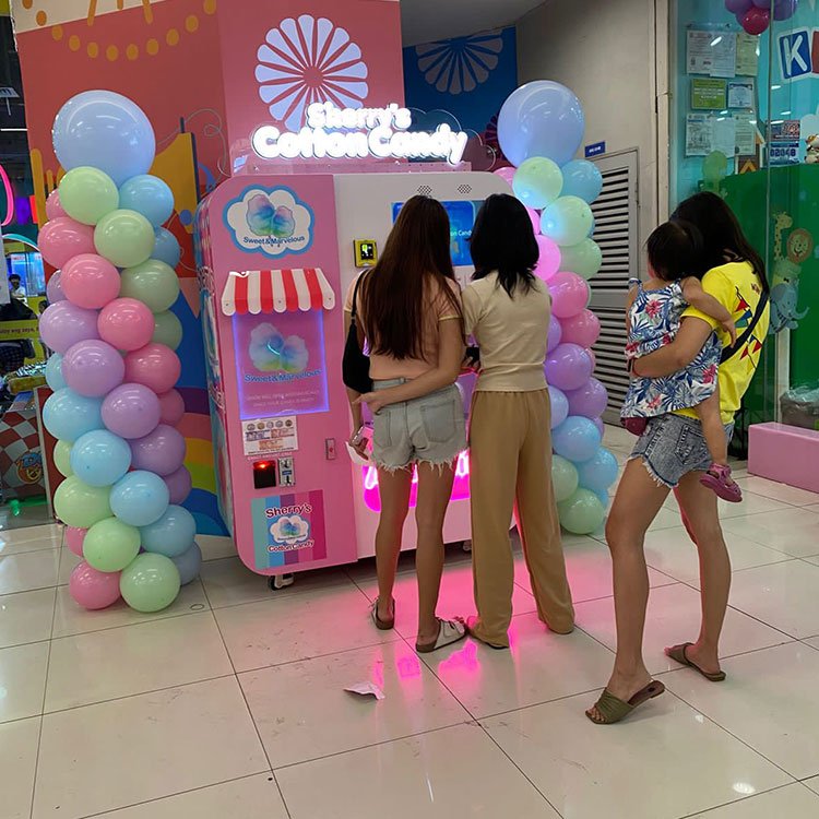 Automatic cotton candy vending machine in a mall