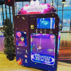 Colorful cotton candy machine at a fair generating profits