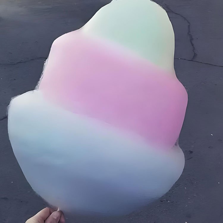 Commercial cotton candy machine heating up to make fluffy candy