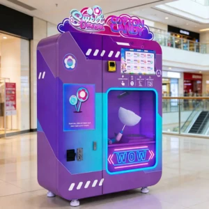 A fully automatic cotton candy vending machine operating in a busy shopping mall