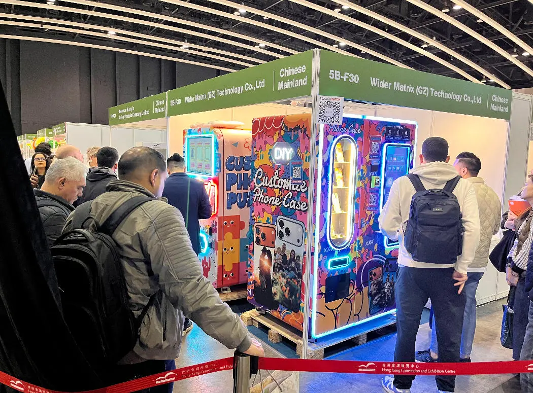 Inside view of a vending machine factory assembly line with quality checks