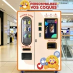 A sleek phone case printing vending machine in a busy shopping center attracting customers